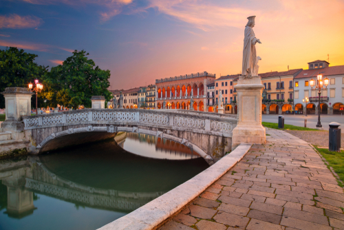 Cityscape image of Padova (Padua), Veneto, Italy with Prato della Valle square during sunset