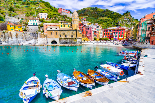 Scenic view of the marina with boats in the colorful fishermen town of Vernazza, Cinque Terre National Park, Liguria, Italy