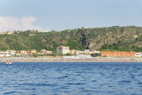 View of people on a beach on the island of Vulcano, Aeolian Islands, near Sicily, Italy