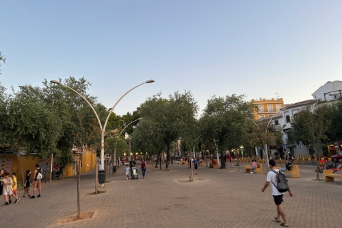 People walking around Alameda de Hercules park in Seville, Andalusia, Spain