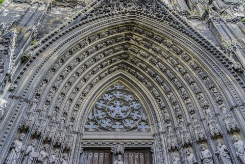 Saints Statues at central portal of western facade of Saint-Ouen-de-Rouen. Rouen Saint-Ouen Abbey Church - Gothic Roman Catholic church in Rouen, Normandy, France