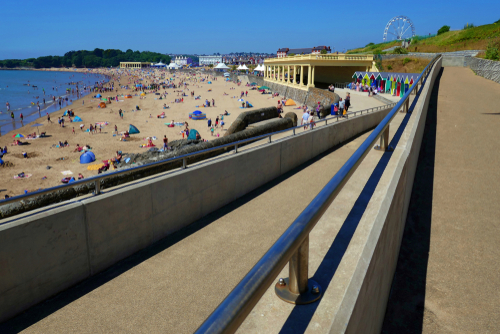 Barry Island beach on a bright sunny day in Barry, Wales, UK