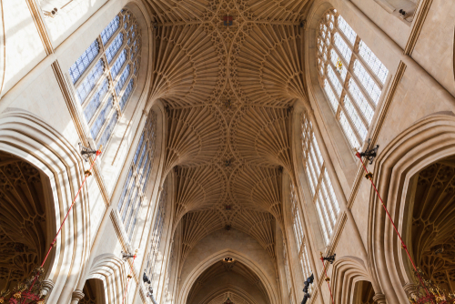 Interior view of the vaulted ceiling and windows of Abbey Church of St. Peter and St.Paul, commonly known as Bath Abbey in Bath, Somerset, England, United Kingdom