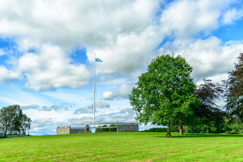 The Rotunda and Saltire flagpole at the Battle of Bannockburn visitors attraction, Bannockburn, Stirlingshire, Scotland, UK