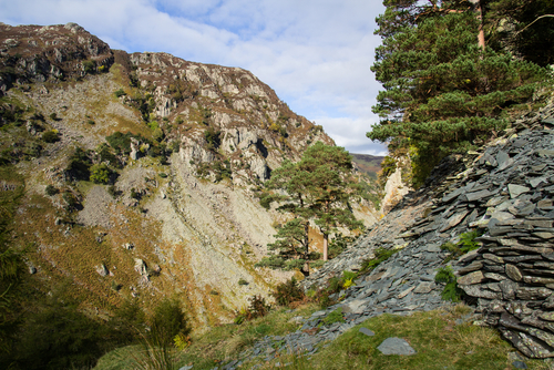 Beautiful scenery and mountains in the background in the Borger Dalr Trail geology walk, Borrowdale Valley near Castle Crag, the Lake District National Park, Cumbria, England, UK