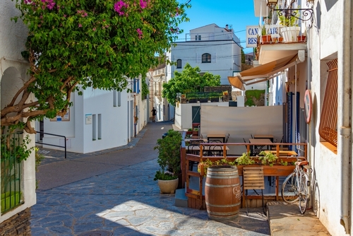 Whitewashed street at Spanish village Cadaques, Costa Brava, Catalonia, Spain