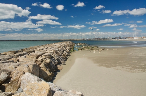 Les Saintes-Maries-de-la-Mer, Provence, France. The beach and harbour at Les Saintes-Maries-de-la-Mer in Spring
