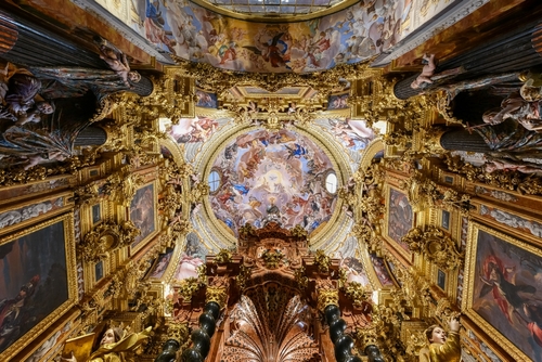 Interior view of the ceiling at the Carthusian monastery church of the Assumption of Our Lady (Monasterio de la Cartuja), Granada, Andalusia, Spain