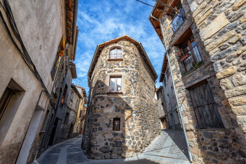 Fork in the road in the historic town of Castellfollit de la Roca, Catalonia, Spain