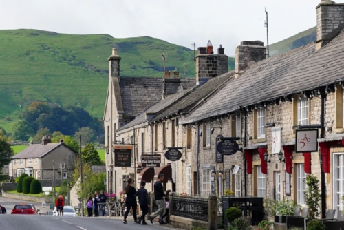 View of a street in the village of Castleton, Peak District National Park, Derbyshire, England, UK