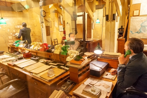 Figures in The Map Room in the Churchill War Rooms of the Imperial War Museum in London, England, United Kingdom