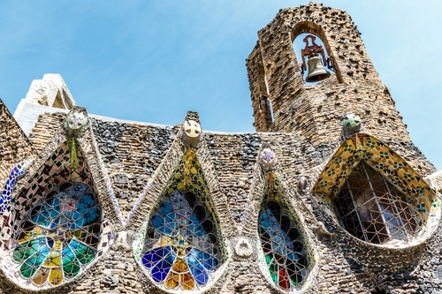 Exterior of Gaudi's crypt with stained-glass in Colonia Guell near Barcelona, Catalonia, Spain