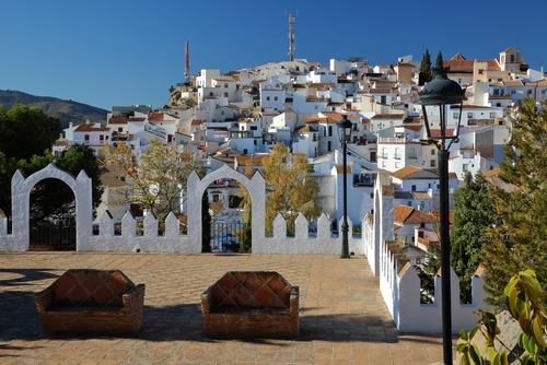 The village of Comares, viewed from the Arabic Castle. Comares is a village of Moorish origin with roofs and whitewashed houses, near Malaga, Andalusia, Spain