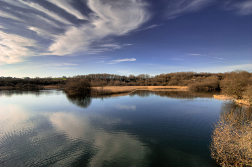 Sky reflection on Lake taken at Cosmeston Lake ,South Wales, United Kingdom