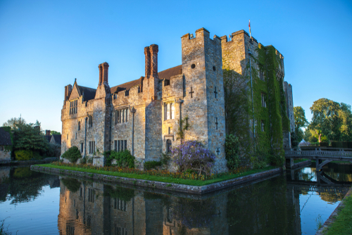 Exterior view of Hever Castle, surrounded by a moat in Kent, England, UK