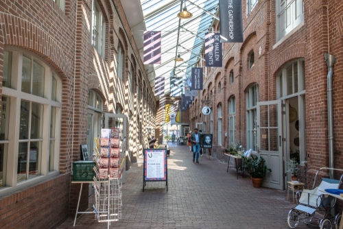 A street in De Hallen, with many shops in Amsterdam, Holland