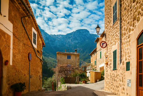 Cozy stone street in the small mountain village Deia on Mallorca island, Balearic Islands, Spain