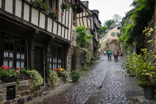 A small alley in the city of Dinan, daylight, summer, Brittany, France