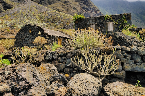 Exterior facades of abandoned stone made houses in a Medieval village in the Eco Museum of Guinea, El Hierro Island, The Canary Islands, Spain