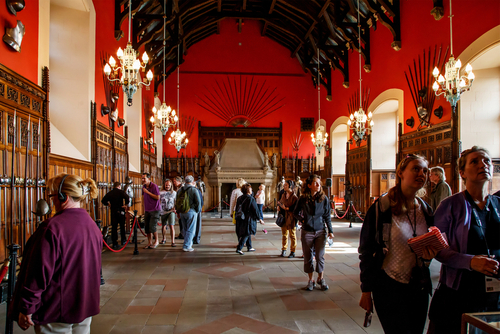 Visitors in the Great Hall of Edinburgh Castle in Edinburgh, Scotland, UK