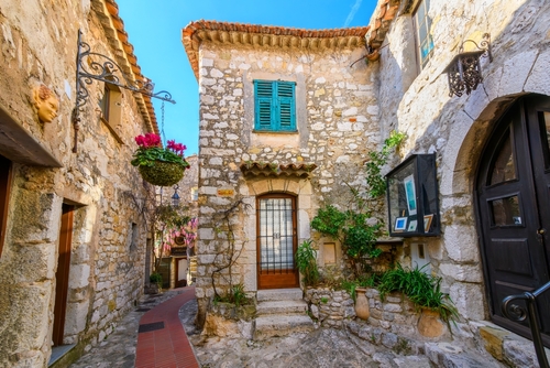 The narrow hillside alleys and streets of shops and cafes inside the medieval hilltop village of Eze, France, along the Cote d'Azur, French Riviera