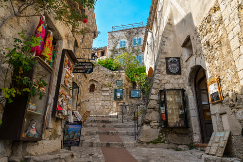 The narrow hillside alleys and streets of shops and cafes inside the medieval hilltop village of Eze, France, along the Cote d'Azur, French Riviera