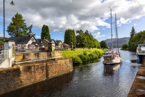 Fort Augustus, the Caledonian canal at the Loch Ness lake. The Canal connects the Scottish east coast at Inverness with the west coast at Corpach near Fort William, Scotland, United Kingdom