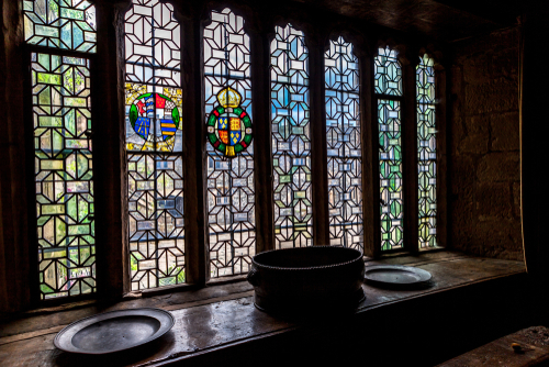 Haddon Hall near Bakewell in Derbyshire dates to the 11th century. The medieval and Tudor hall includes additions added between the 13-17 century, located in the Peak District National Park, Derbyshire, England, UK