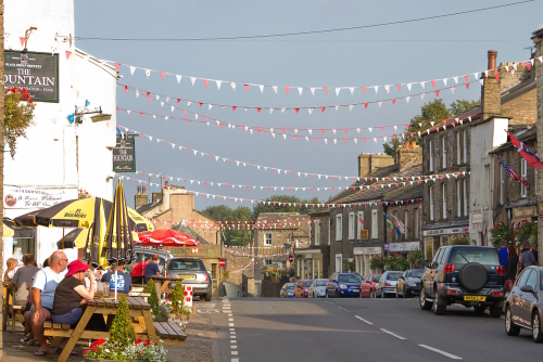 The idyllic market town of Hawes in North Yorkshire, the streets and pubs adorned with bunting and decorations, ready for the Tour de la Yorkshire, England, United Kingdom