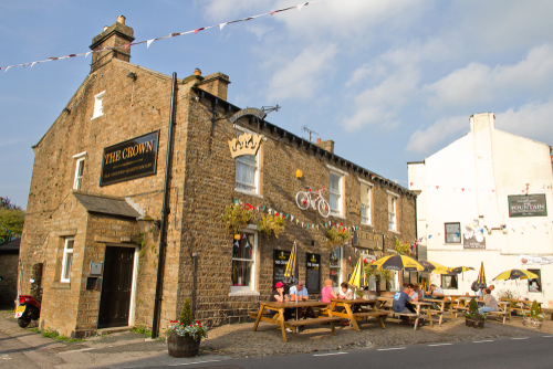 The idyllic market town of Hawes in North Yorkshire, the streets and pubs adorned with bunting and decorations, ready for the Tour de la Yorkshire, England, UK