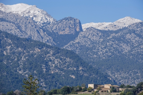 Snow-capped Puig de Massanella seen from Buger village, Mallorca Island, Balearic Islands, Spain