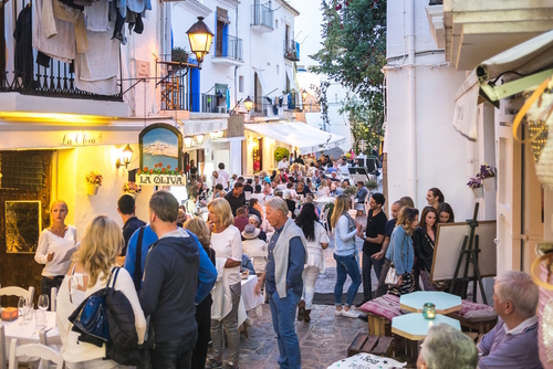 View of Ibiza old town nightlife in Dalt Vila plenty of people dining at restaurants, Ibiza island, Balearic Islands, Spain
