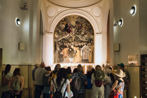 People viewing the painting 