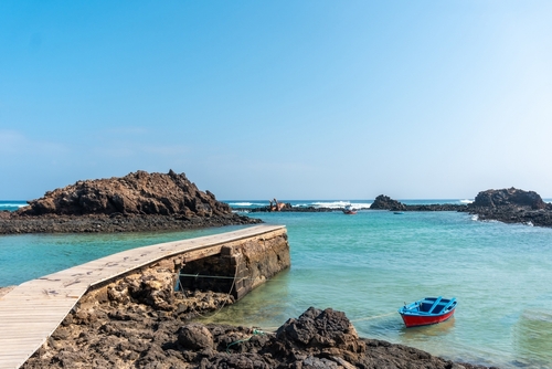 El Puertito wooden footbridge on the Isla de Lobos, next to the north coast of the island of Fuerteventura, Canary Islands, Spain
