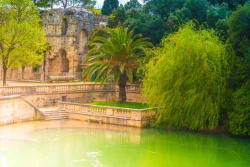 A beautiful fountain in the Jardin de la fontaine in Nimes, Provence, France
