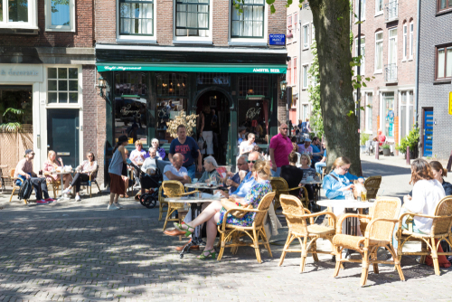 People enjoying the dutch cafe Hageraad located near Jordaan district in Amsterdam, Holland