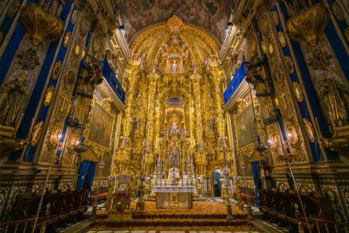 Beautiful and magnificent main altar in the Basilica of San Juan de Dios in Granada, Andalusia, Spain