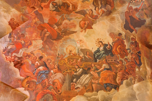 The ceiling fresco displays the Glory of lamb of God in Basilica San Juan de Dios by Diego Sanchez Sarabia in Granada, Andalusia, Spain