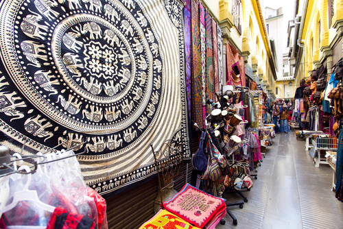 Alcaiceria Market in Granada, Andalusia, Spain. Narrow streets filled with shops called Alcaiceria, originally home to a Moorish silk market