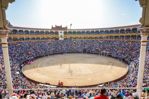 Plaza de Toros de Las Ventas interior view with tourists gathering for the bull show in Madrid on a Sunny day, Spain