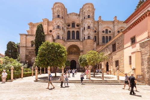 View of the facade of the Malaga Cathedral or Santa Iglesia Catedral Basílica de la Encarnación, Malaga, Andalusia, Spain
