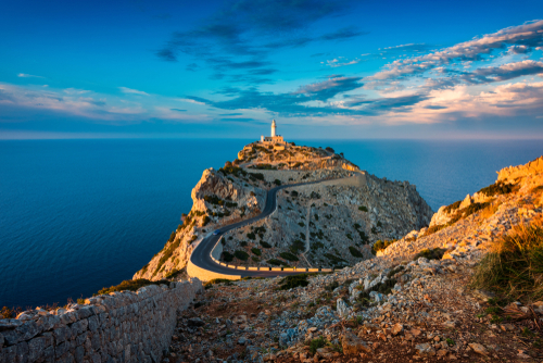 Dramatic view during Sunset of the lighthouse of Cap de Formentor, Mallorca island, Balearic Islands, Spain