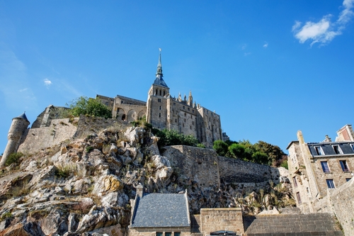Panorama of Mont Saint Michel abbey in a beautiful summer day, Normandy, France