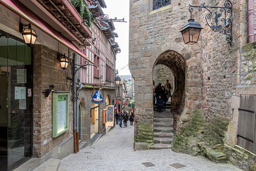 Mont Saint Michel, downtown and these multiple superb signs of Craftsmen, Normandy, France