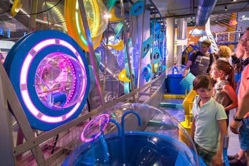 Families enjoying the exhibitions at the Nemo Science Museum, Science educational museum in Amsterdam, The Netherlands