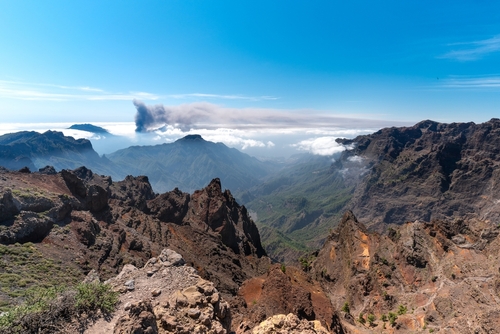 View of Cumbre vieja Natural Park from Caldera de Taburiente, volcano smoke above the clouds, La Palma island, The Canary Islands, Spain