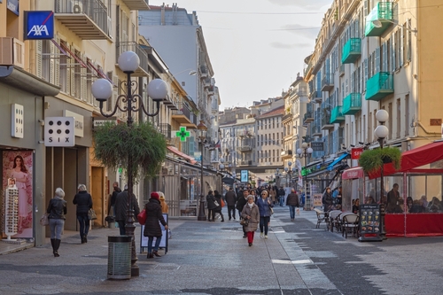 People Walking at Rue Massena Street at Cold Winter Day. Nice, Cote d'Azur, France