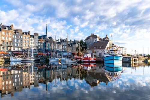 Honfleur, beautiful city in France, the harbor in the morning, reflection on the river, Normandy, France