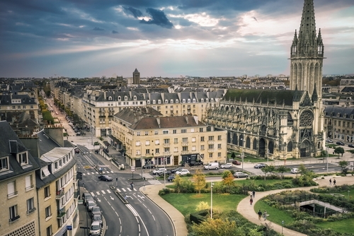 Caen, Normandy, France. Church of Saint-Pierre in Caen, Normandy, view of the panorama of the city from the castle walls. The dramatic sky