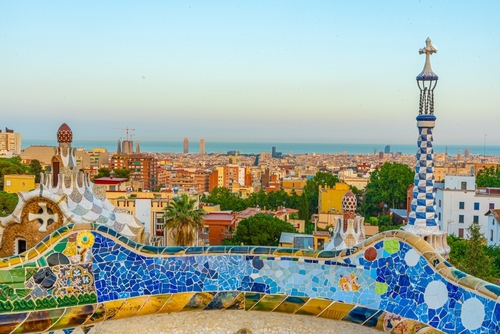 Sunset view of Parc Guell and its beautiful mosaics in Barcelona, Catalonia, Spain